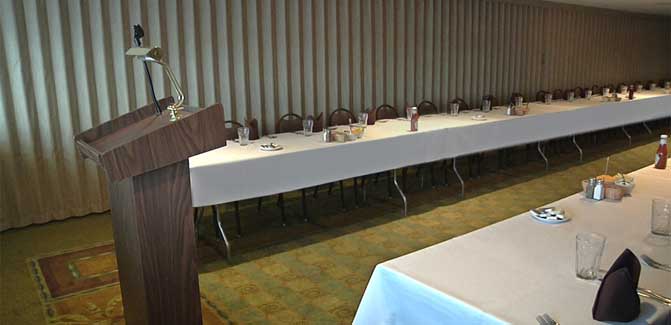 Monument Inn meeting room with podium